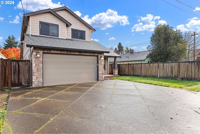 2721 La Darrah St, Eugene, OR 97404 - view of front facade with stone siding, asphalt driveway, an attached garage, and a shingled roof