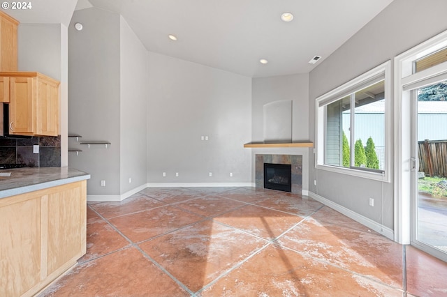 2721 La Darrah St, Eugene, OR 97404 - unfurnished living room featuring a tile fireplace, baseboards, and recessed lighting