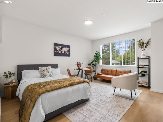 bedroom with wood-type flooring