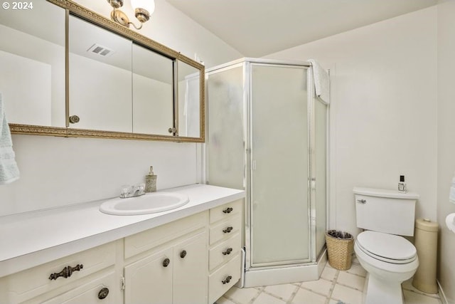 10685 Oak Dr SE, Salem, OR 97306 - bathroom featuring vanity, toilet, a shower stall, tile patterned floors, and visible vents