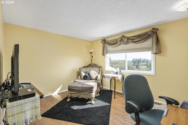 10685 Oak Dr SE, Salem, OR 97306 - office space with baseboards, wood finished floors, and a textured ceiling