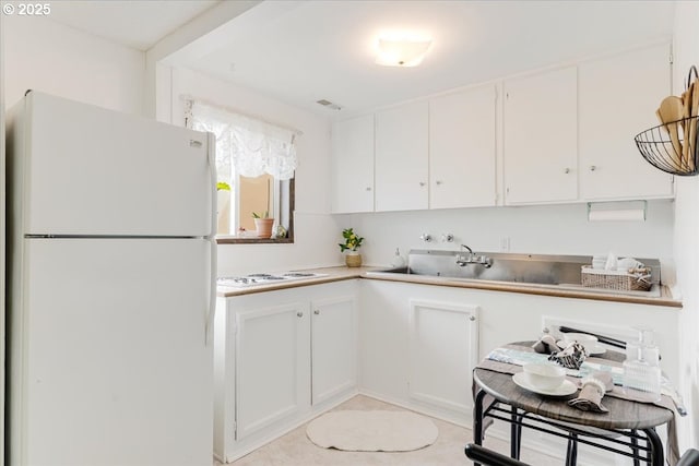 10685 Oak Dr SE, Salem, OR 97306 - kitchen with white appliances, white cabinets, and light countertops