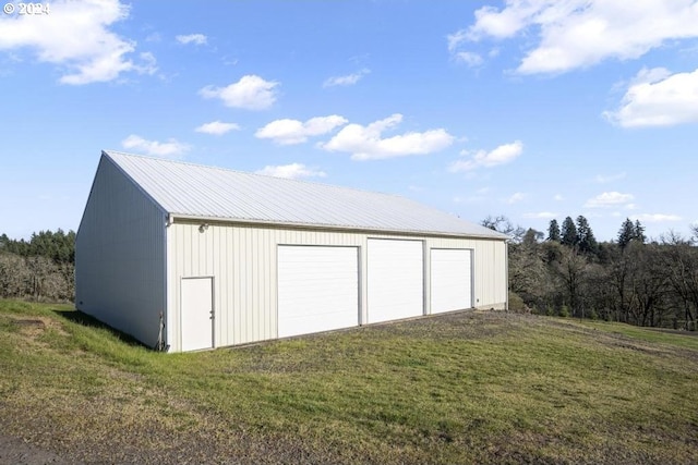 garage with a lawn