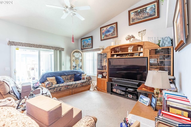 living room with carpet, vaulted ceiling, and ceiling fan