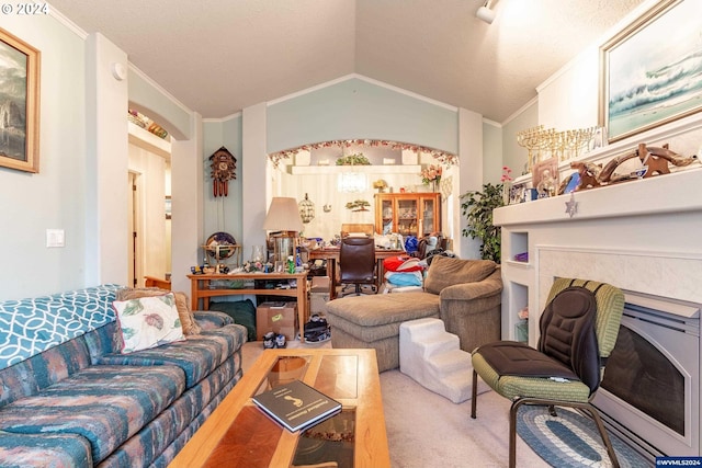 living room with a textured ceiling, light colored carpet, lofted ceiling, and ornamental molding