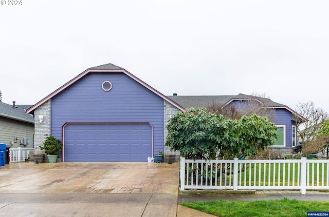 view of front of property with a garage