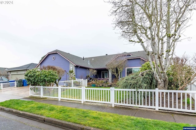 view of front of home with a front yard