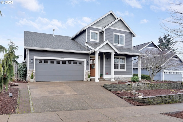 craftsman inspired home with a garage