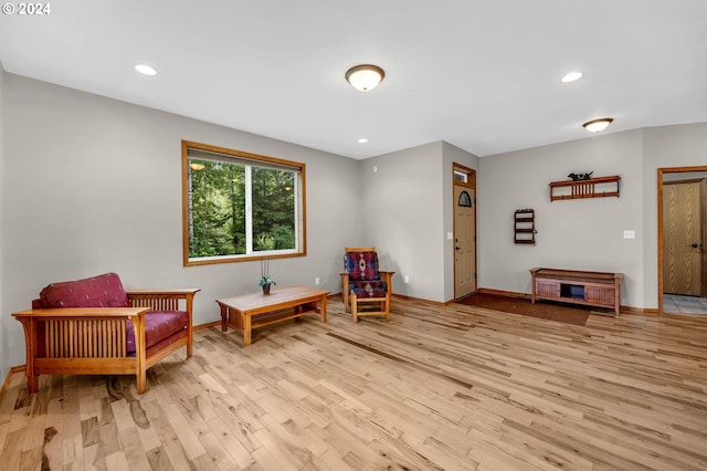 sitting room featuring light hardwood / wood-style floors