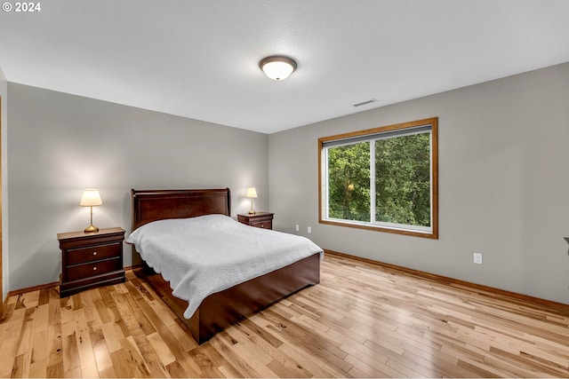 bedroom featuring light hardwood / wood-style floors