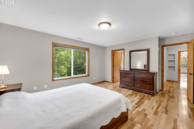 bedroom featuring light hardwood / wood-style flooring