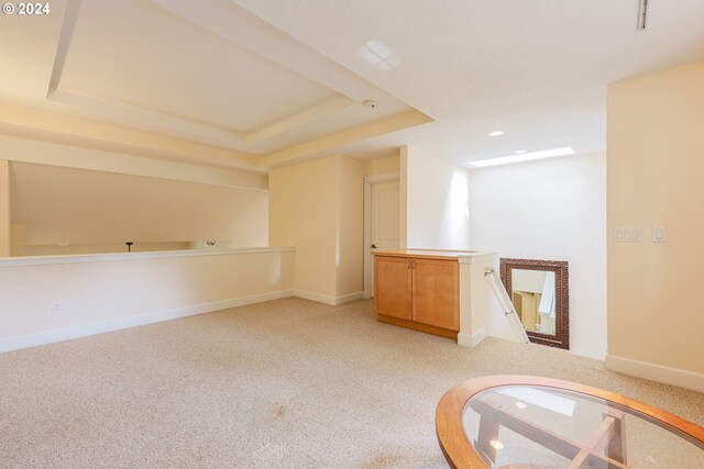 bonus room featuring light colored carpet