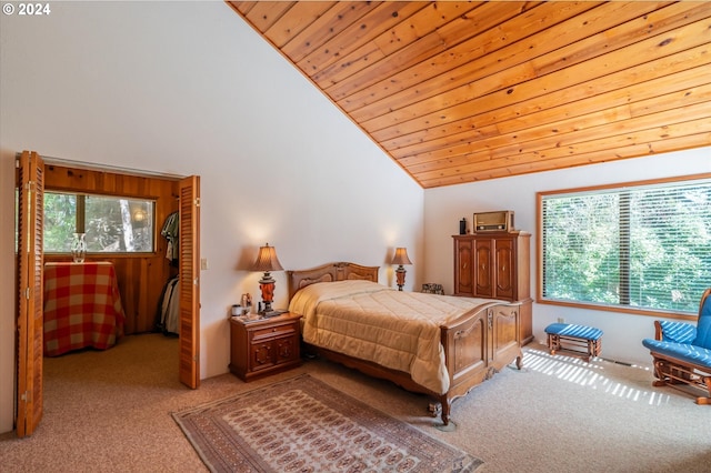 carpeted bedroom featuring multiple windows, high vaulted ceiling, and wood ceiling