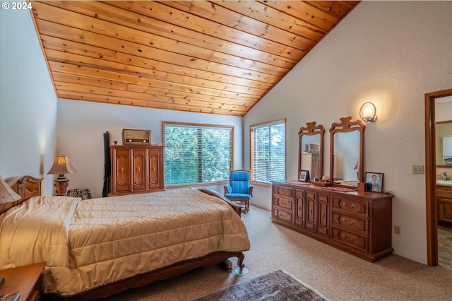 bedroom featuring lofted ceiling, sink, light colored carpet, and wooden ceiling