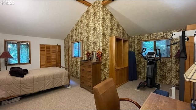 bedroom featuring light colored carpet and high vaulted ceiling