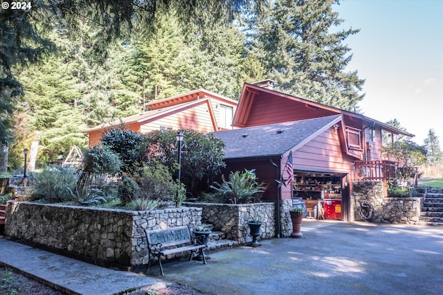 view of property exterior with a garage