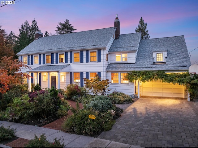 colonial home featuring a garage