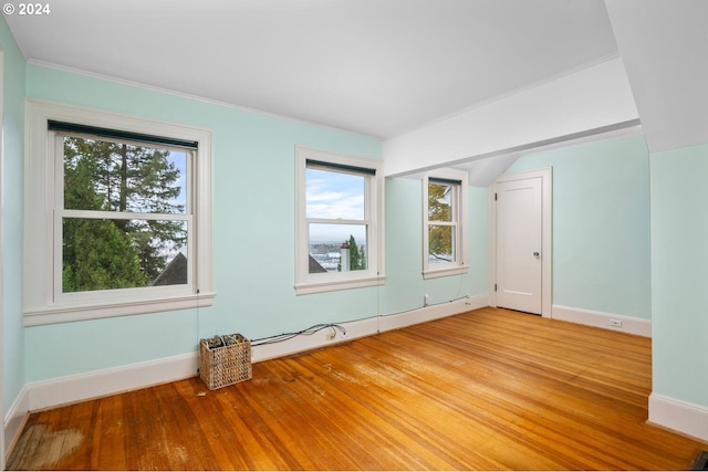 unfurnished room featuring hardwood / wood-style floors