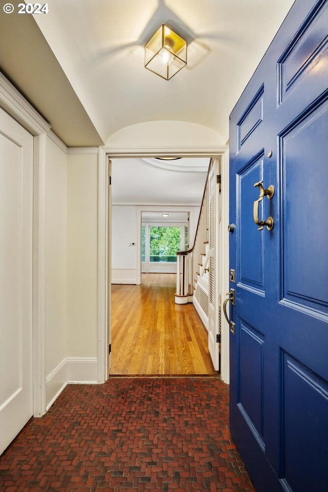 corridor featuring dark hardwood / wood-style floors