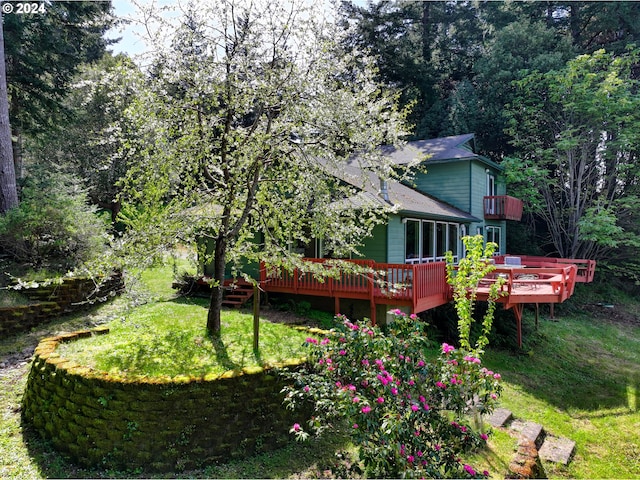 view of yard featuring a wooden deck