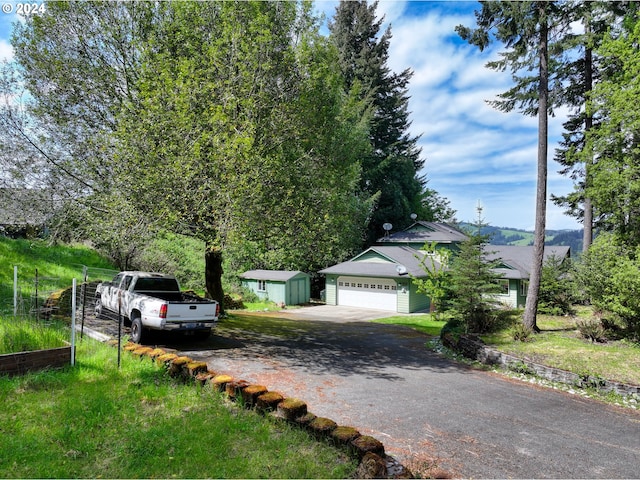 view of side of property with a storage shed