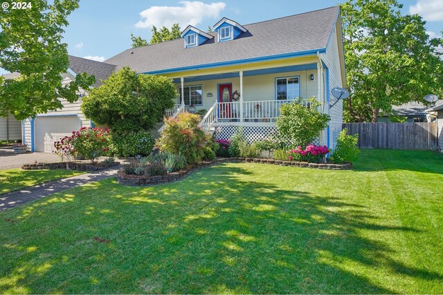 view of front of home with a porch and a front lawn