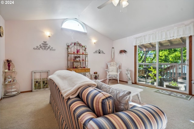 living room featuring ceiling fan, lofted ceiling, and light carpet