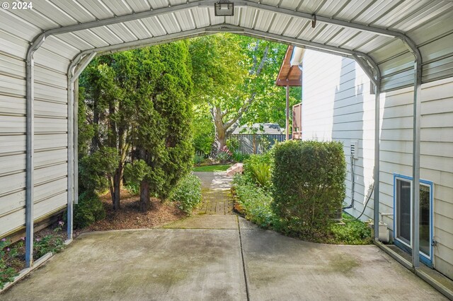 exterior space with a carport