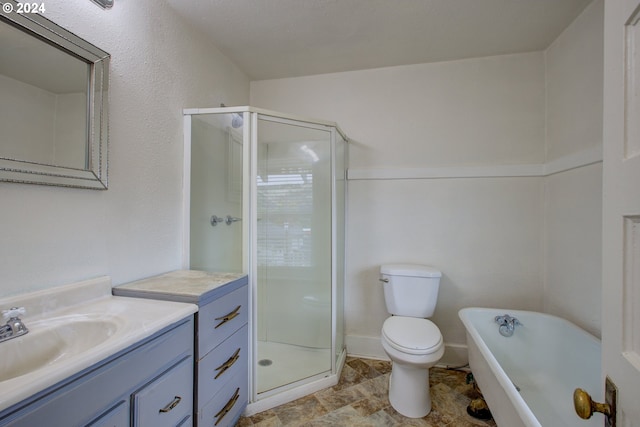 full bathroom featuring shower with separate bathtub, vanity, and toilet