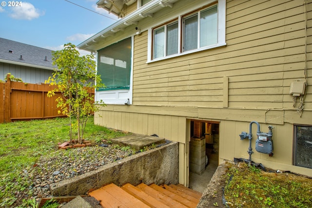 view of property exterior with fence