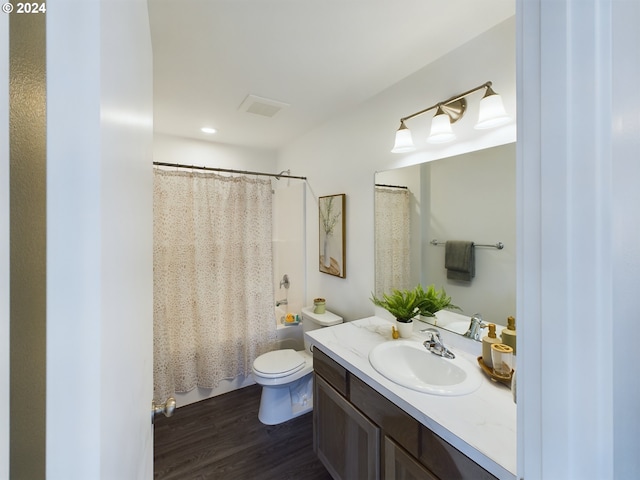 full bathroom featuring toilet, vanity, shower / bath combo, and hardwood / wood-style flooring