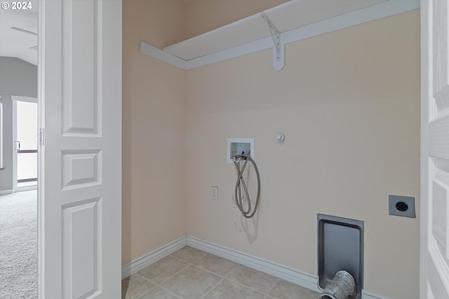 washroom with baseboards, washer hookup, laundry area, hookup for a gas dryer, and hookup for an electric dryer