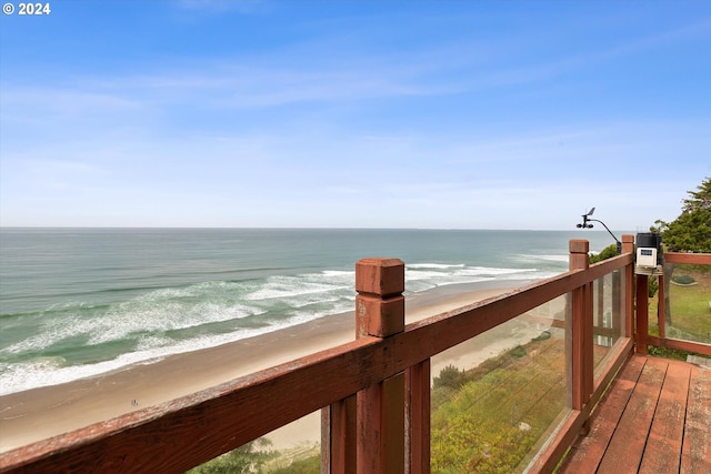 view of water feature with a beach view