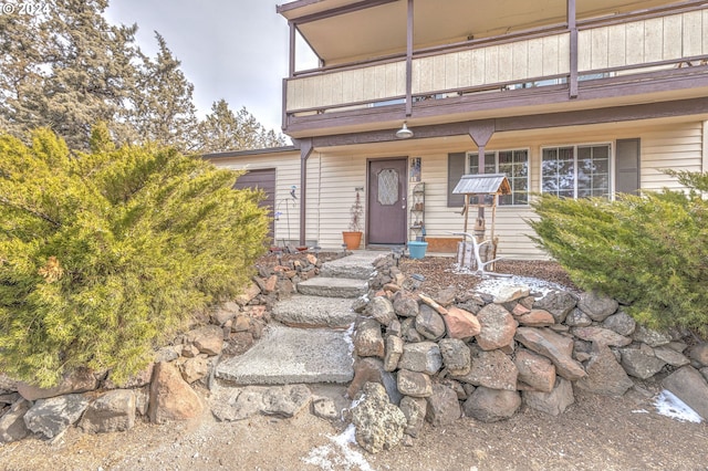 doorway to property with a balcony