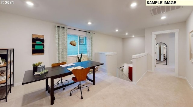 home office featuring light colored carpet