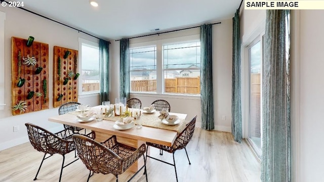 dining room featuring light wood-type flooring