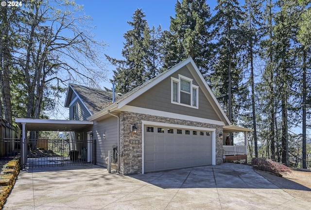 view of front facade featuring a garage and a carport