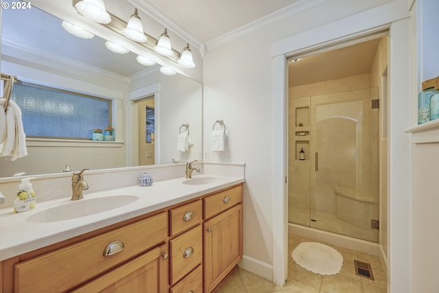 bathroom with crown molding, vanity, tile patterned floors, and a shower with shower door