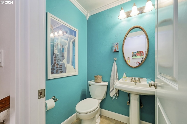 bathroom with ornamental molding and toilet