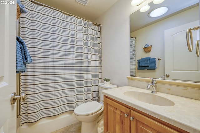 full bathroom with vanity, toilet, shower / bathtub combination with curtain, and tile patterned floors