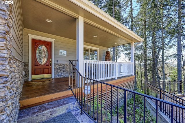 doorway to property with covered porch