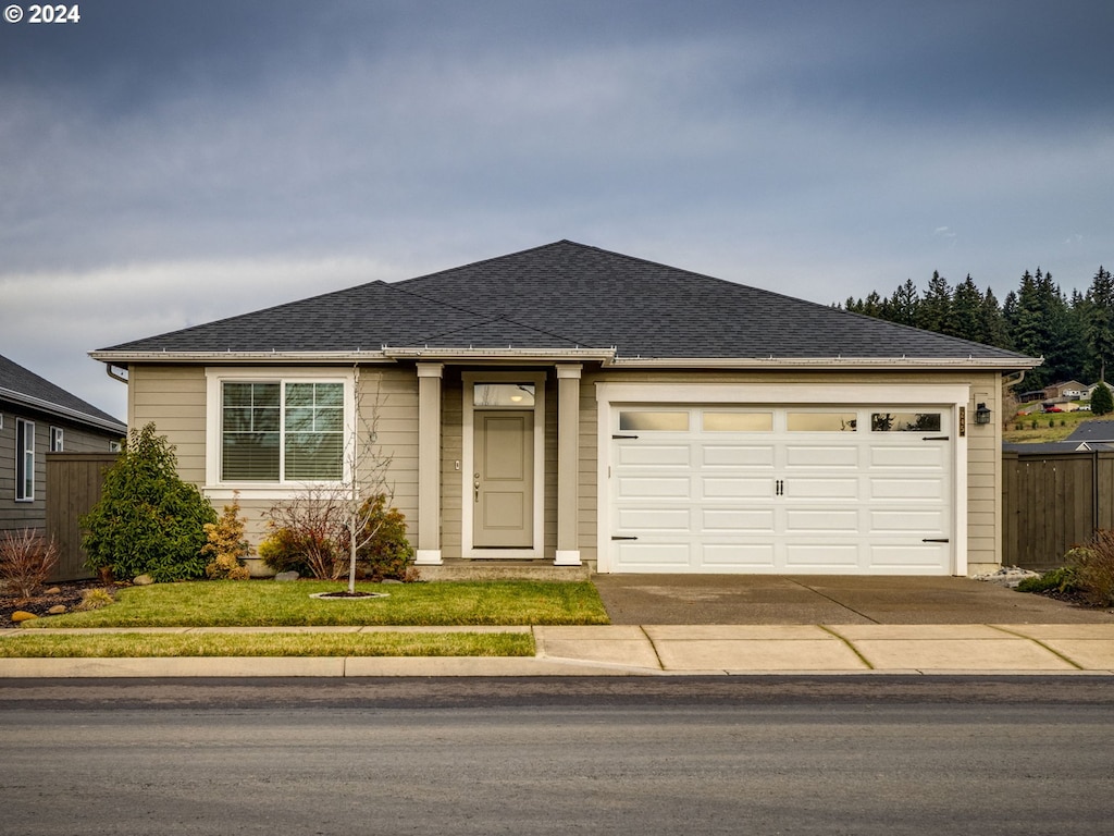 view of front of home featuring a garage