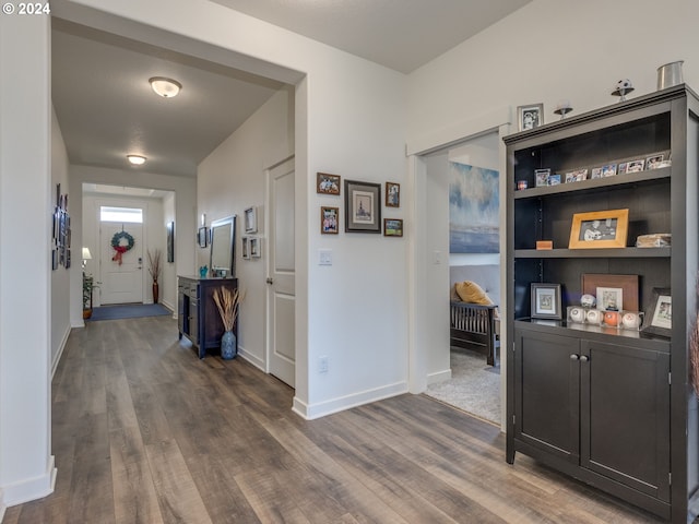 corridor featuring dark wood-type flooring