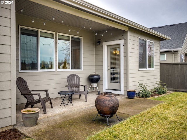 view of patio featuring a grill and a fire pit