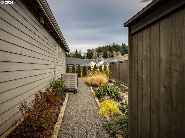 view of yard with central AC