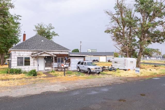 bungalow-style home with a garage