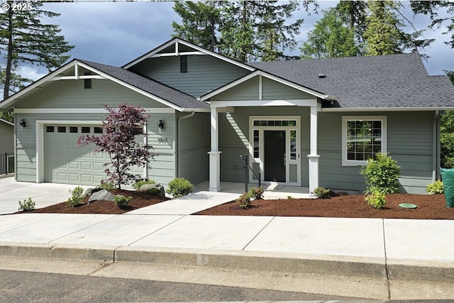 3404 River Heights Dr, Springfield, OR 97477 - view of front facade with an attached garage, concrete driveway, and roof with shingles
