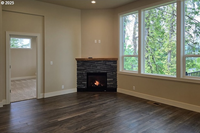 3404 River Heights Dr, Springfield, OR 97477 - unfurnished living room featuring baseboards, dark wood-type flooring, and recessed lighting
