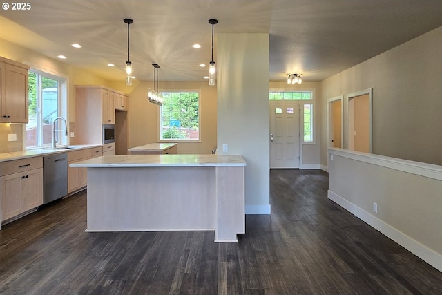 3404 River Heights Dr, Springfield, OR 97477 - kitchen with appliances with stainless steel finishes, a sink, dark wood-type flooring, baseboards, and plenty of natural light