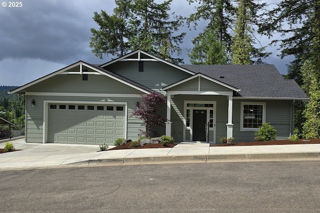 3404 River Heights Dr, Springfield, OR 97477 - craftsman-style home with concrete driveway, a garage, and a shingled roof